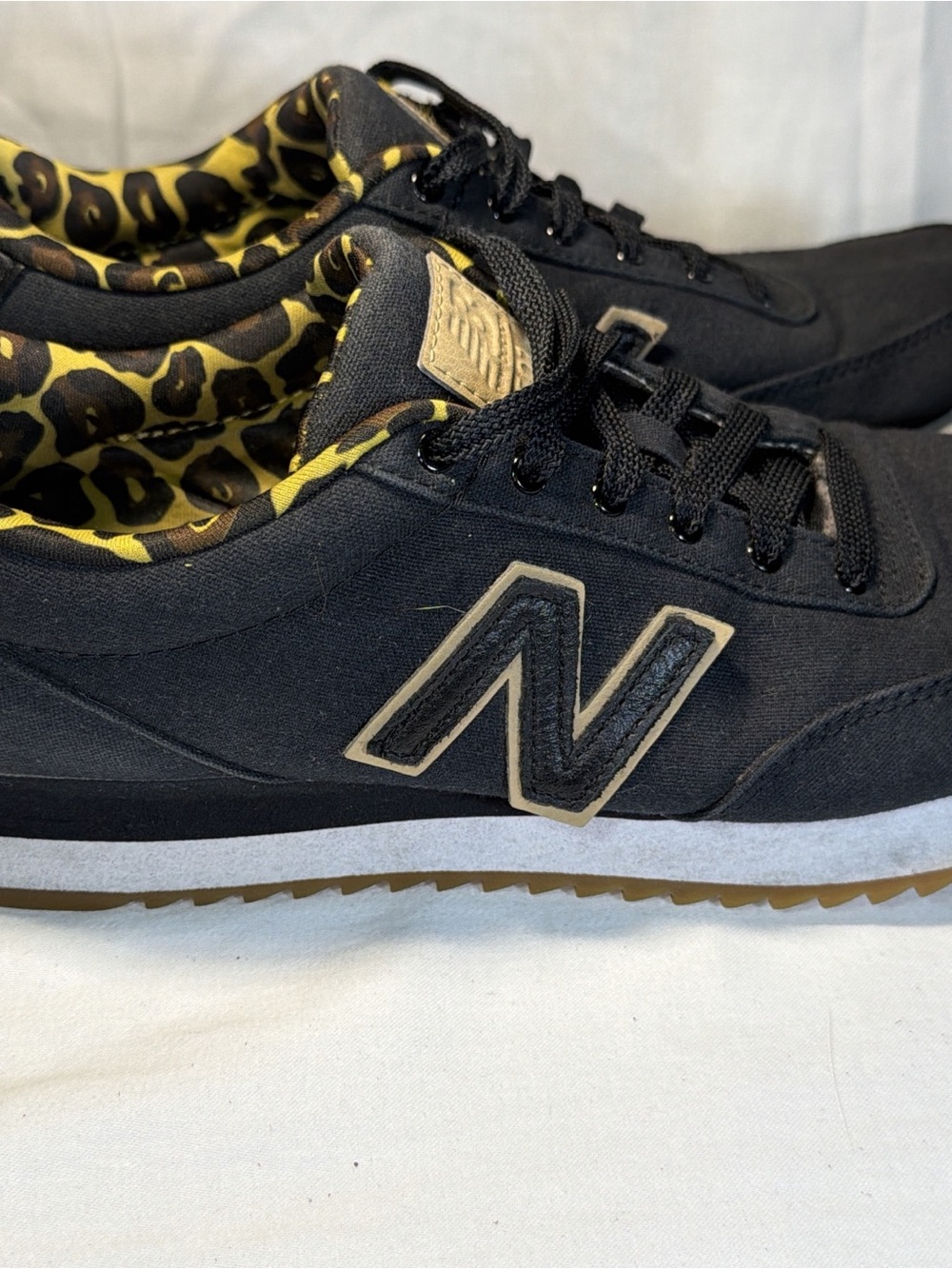 New Balance Black Sneakers with Yellow Leopard Lining